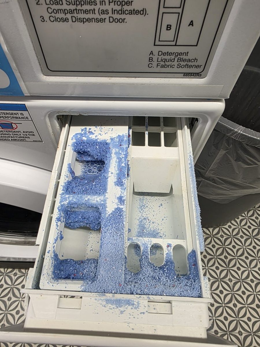 Too much detergent overflowing a washer